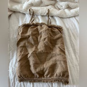 This is a small brown ruffled tank top!